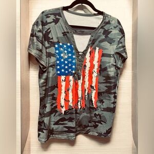 Lace up Keyhole Tee with flag. Size Large
